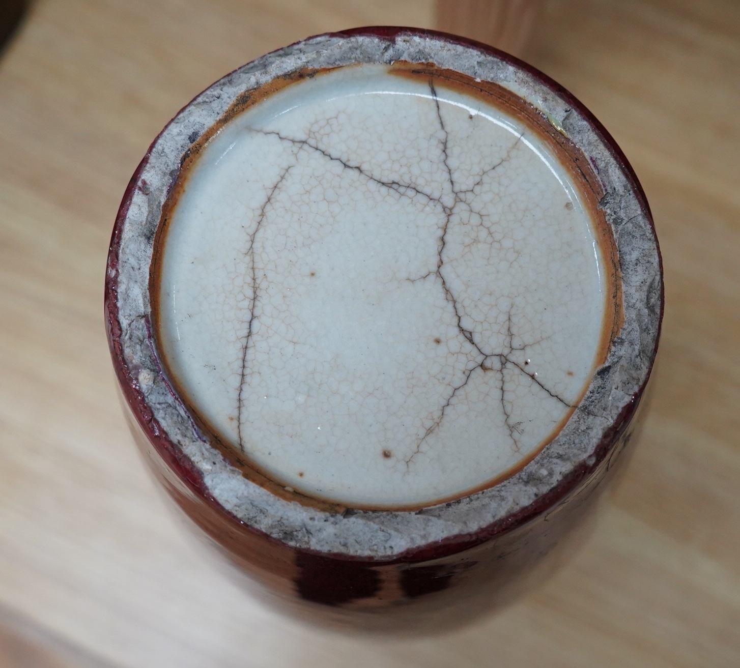 An 18th century Chinese sang de boeuf glazed vase, 34cm. Condition - ground down